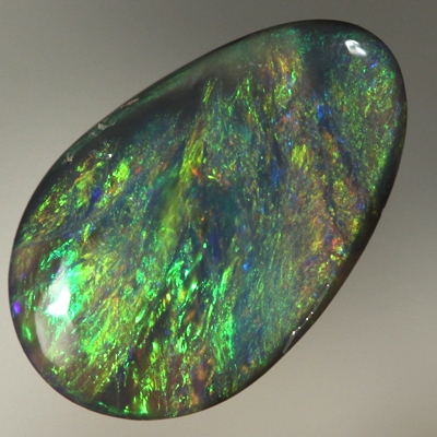 SOLID BLACK OPAL Strong, bright golden fire. Orange and green